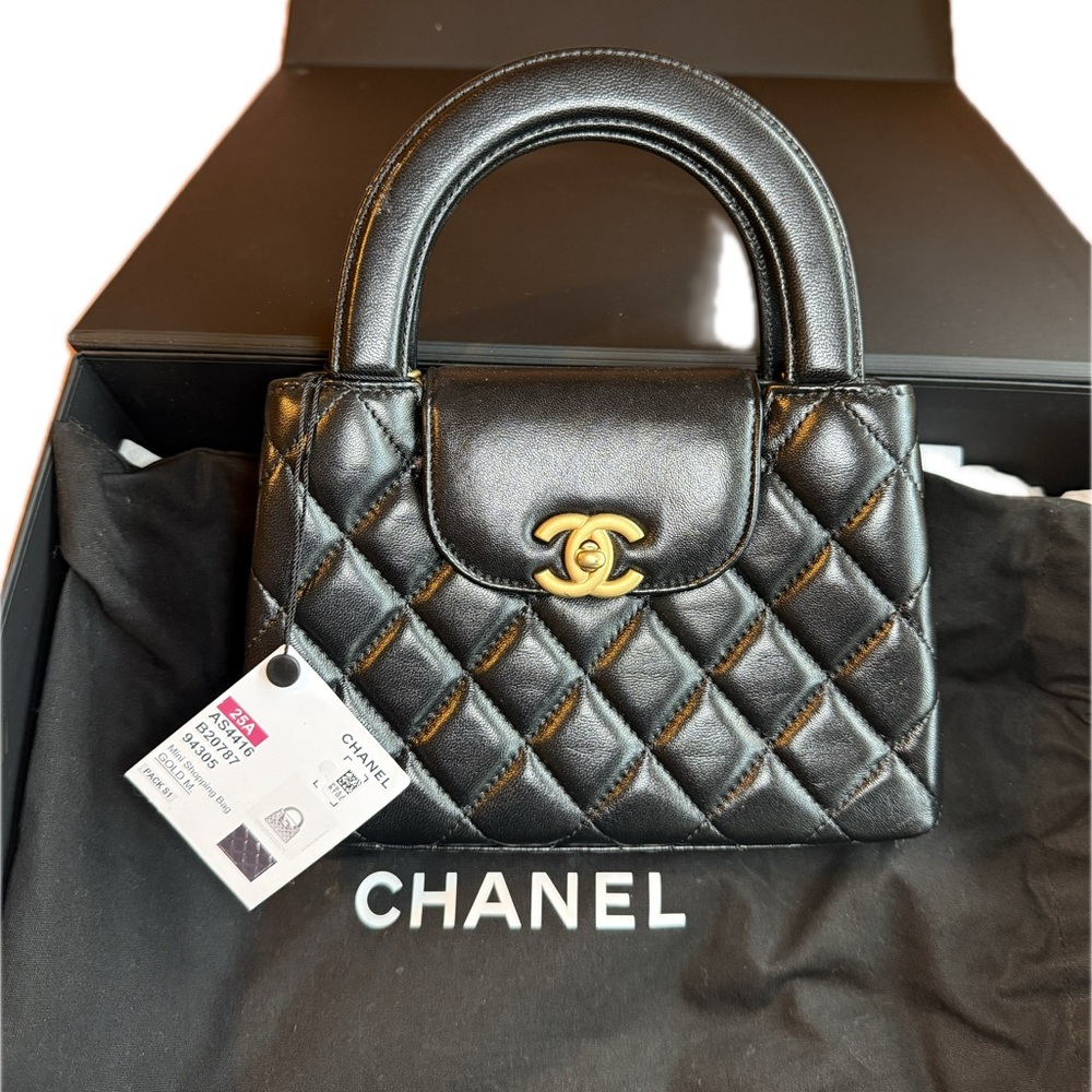 Chanel Black Quilted 
Mini Kelly Shopper